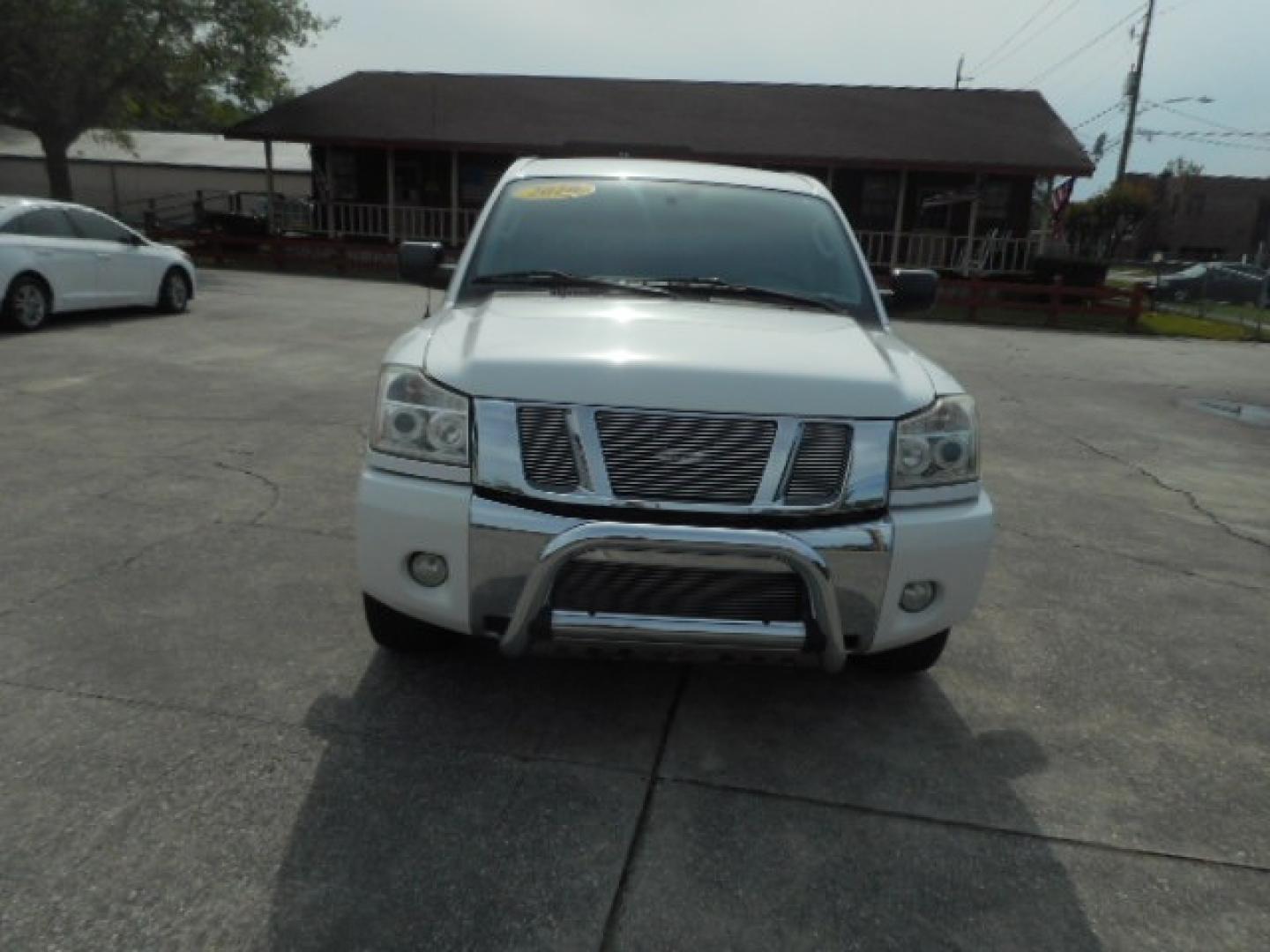 2010 WHITE NISSAN TITAN SE; LE; XE (1N6BA0ED7AN) , located at 10405 Abercorn Street, Savannah, GA, 31419, (912) 921-8965, 31.988262, -81.131760 - Photo#0